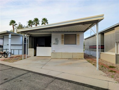 Privacy at its finest. Enclosed patio area in the front of the on Riverview Golf Course in Arizona - for sale on GolfHomes.com, golf home, golf lot