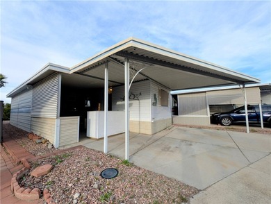 Privacy at its finest. Enclosed patio area in the front of the on Riverview Golf Course in Arizona - for sale on GolfHomes.com, golf home, golf lot