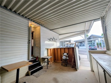 Privacy at its finest. Enclosed patio area in the front of the on Riverview Golf Course in Arizona - for sale on GolfHomes.com, golf home, golf lot