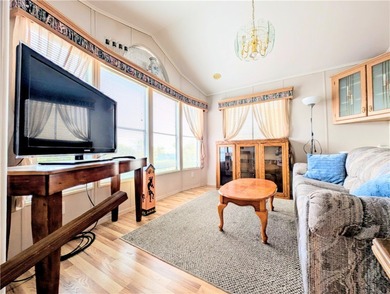 Privacy at its finest. Enclosed patio area in the front of the on Riverview Golf Course in Arizona - for sale on GolfHomes.com, golf home, golf lot