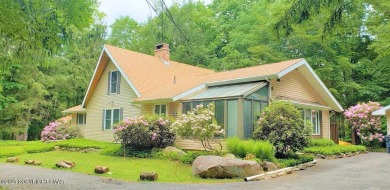 Spacious 4-bedroom, 2.5-bathroom home in Pocono Farms Country on Pocono Farms Country Club in Pennsylvania - for sale on GolfHomes.com, golf home, golf lot