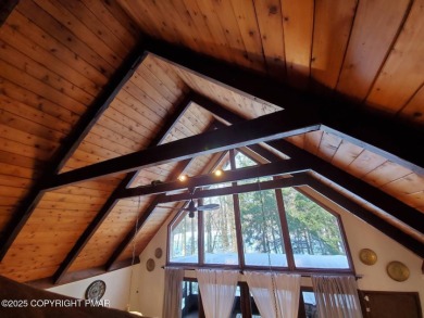 Spacious 4-bedroom, 2.5-bathroom home in Pocono Farms Country on Pocono Farms Country Club in Pennsylvania - for sale on GolfHomes.com, golf home, golf lot