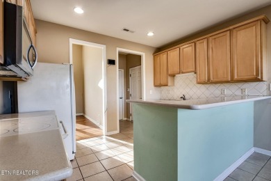 This very well maintained basement rancher features 4 bedrooms on Toqua Golf Course - Loudon County in Tennessee - for sale on GolfHomes.com, golf home, golf lot