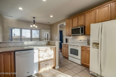 This very well maintained basement rancher features 4 bedrooms on Toqua Golf Course - Loudon County in Tennessee - for sale on GolfHomes.com, golf home, golf lot