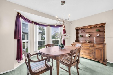 Welcome to this beautiful end-unit Sutton Place villa, offering on Highland Lakes Executive Golf Course in Florida - for sale on GolfHomes.com, golf home, golf lot