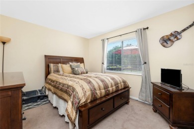 Absolutely Charming home nestled on a large fenced yard along a on Port Charlotte Golf Club in Florida - for sale on GolfHomes.com, golf home, golf lot