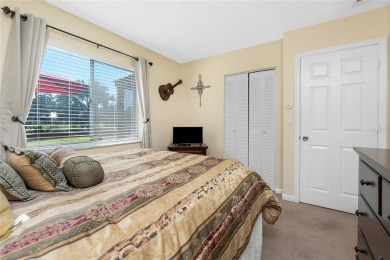 Absolutely Charming home nestled on a large fenced yard along a on Port Charlotte Golf Club in Florida - for sale on GolfHomes.com, golf home, golf lot