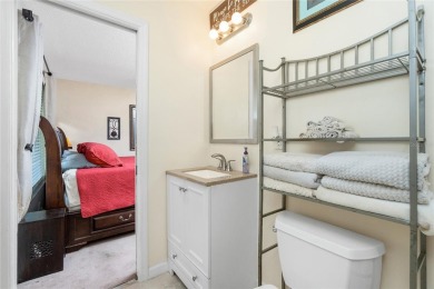Absolutely Charming home nestled on a large fenced yard along a on Port Charlotte Golf Club in Florida - for sale on GolfHomes.com, golf home, golf lot