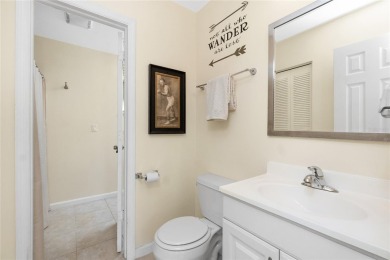 Absolutely Charming home nestled on a large fenced yard along a on Port Charlotte Golf Club in Florida - for sale on GolfHomes.com, golf home, golf lot