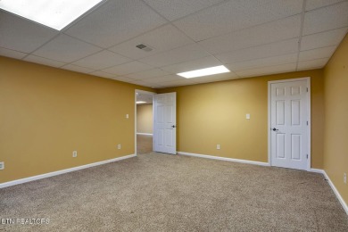 This very well maintained basement rancher features 4 bedrooms on Toqua Golf Course - Loudon County in Tennessee - for sale on GolfHomes.com, golf home, golf lot