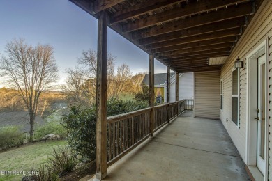 This very well maintained basement rancher features 4 bedrooms on Toqua Golf Course - Loudon County in Tennessee - for sale on GolfHomes.com, golf home, golf lot