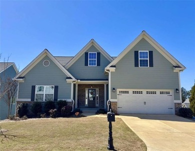 Welcome to ranch-level living in Traditions of Braselton! As you on Traditions of Braselton Golf Club in Georgia - for sale on GolfHomes.com, golf home, golf lot