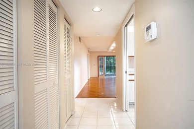 Welcome to this spacious corner 2-bedroom, 2-bath residence on Hollybrook Golf and Tennis Club  in Florida - for sale on GolfHomes.com, golf home, golf lot