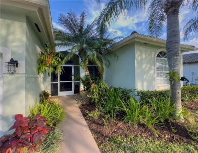 Impeccably maintained lakefront home in the coveted golf course on Keys Gate Golf Club in Florida - for sale on GolfHomes.com, golf home, golf lot