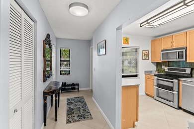 Beautifully maintained 2-bedroom, 2-bath corner unit featuring on Boca Lago Golf and Country Club in Florida - for sale on GolfHomes.com, golf home, golf lot