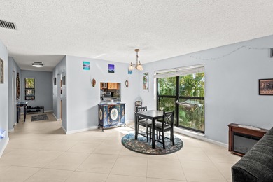Beautifully maintained 2-bedroom, 2-bath corner unit featuring on Boca Lago Golf and Country Club in Florida - for sale on GolfHomes.com, golf home, golf lot
