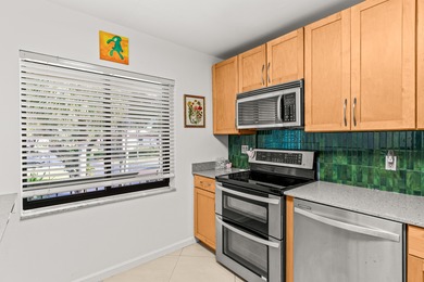 Beautifully maintained 2-bedroom, 2-bath corner unit featuring on Boca Lago Golf and Country Club in Florida - for sale on GolfHomes.com, golf home, golf lot