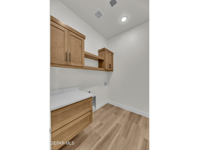 Experience luxury living in this beautifully crafted home on Emerald Springs Golf Course in Texas - for sale on GolfHomes.com, golf home, golf lot