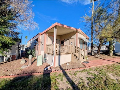 This is it! The perfect home for a getaway or full-time luxury on Riverview Golf Course in Arizona - for sale on GolfHomes.com, golf home, golf lot