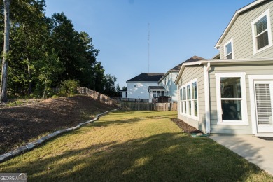 Situated on a friendly cul-de-sac, this stunning and practically on Reunion Golf Club in Georgia - for sale on GolfHomes.com, golf home, golf lot