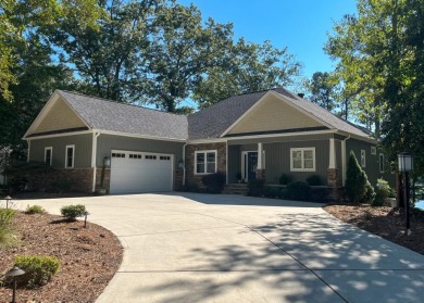 This custom Craftsman lake front home in Carolina Trace's Golf on Carolina Trace Country Club in North Carolina - for sale on GolfHomes.com, golf home, golf lot