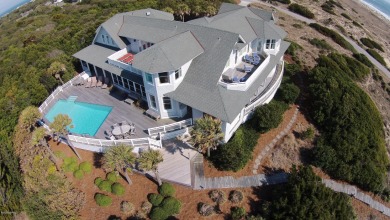 This six-bedroom home on the High Dunes provides panoramas of on Bald Head Island Golf Club in North Carolina - for sale on GolfHomes.com, golf home, golf lot