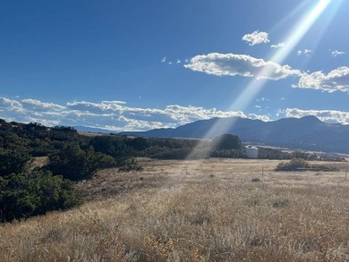 Discover your slice of Colorado paradise on this 1+ acre lot in on Hollydot Golf Course in Colorado - for sale on GolfHomes.com, golf home, golf lot