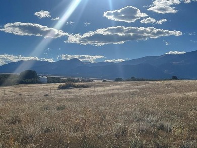 Discover your slice of Colorado paradise on this 1+ acre lot in on Hollydot Golf Course in Colorado - for sale on GolfHomes.com, golf home, golf lot