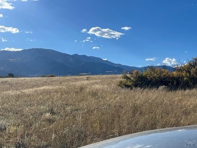 Discover your slice of Colorado paradise on this 1+ acre lot in on Hollydot Golf Course in Colorado - for sale on GolfHomes.com, golf home, golf lot