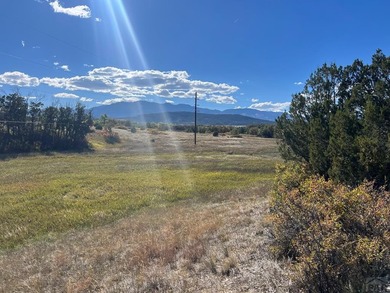 Discover your slice of Colorado paradise on this 1+ acre lot in on Hollydot Golf Course in Colorado - for sale on GolfHomes.com, golf home, golf lot