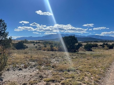 Discover your slice of Colorado paradise on this 1+ acre lot in on Hollydot Golf Course in Colorado - for sale on GolfHomes.com, golf home, golf lot