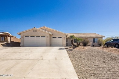 This inviting south-side home features an open concept living on London Bridge Golf Course in Arizona - for sale on GolfHomes.com, golf home, golf lot