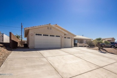 This inviting south-side home features an open concept living on London Bridge Golf Course in Arizona - for sale on GolfHomes.com, golf home, golf lot