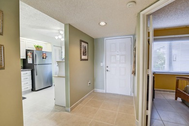 This charming 2-bed, 2-bath condo in the beloved 55+ Century on Flamingo Lakes Country Club in Florida - for sale on GolfHomes.com, golf home, golf lot