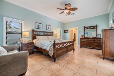 Discover this beautifully updated, move-in-ready pool home on East Lake Woodlands Country Club in Florida - for sale on GolfHomes.com, golf home, golf lot