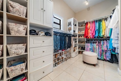 Discover this beautifully updated, move-in-ready pool home on East Lake Woodlands Country Club in Florida - for sale on GolfHomes.com, golf home, golf lot