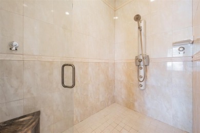 Discover this beautifully updated, move-in-ready pool home on East Lake Woodlands Country Club in Florida - for sale on GolfHomes.com, golf home, golf lot