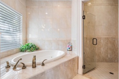 Discover this beautifully updated, move-in-ready pool home on East Lake Woodlands Country Club in Florida - for sale on GolfHomes.com, golf home, golf lot