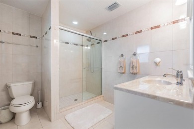 Discover this beautifully updated, move-in-ready pool home on East Lake Woodlands Country Club in Florida - for sale on GolfHomes.com, golf home, golf lot