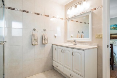 Discover this beautifully updated, move-in-ready pool home on East Lake Woodlands Country Club in Florida - for sale on GolfHomes.com, golf home, golf lot