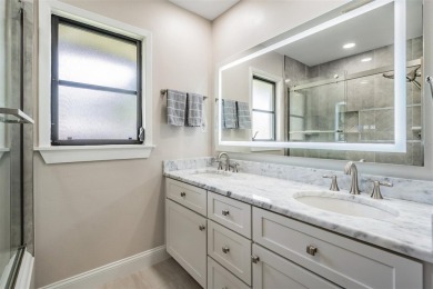 Discover this beautifully updated, move-in-ready pool home on East Lake Woodlands Country Club in Florida - for sale on GolfHomes.com, golf home, golf lot