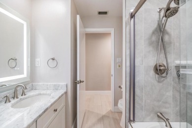 Discover this beautifully updated, move-in-ready pool home on East Lake Woodlands Country Club in Florida - for sale on GolfHomes.com, golf home, golf lot