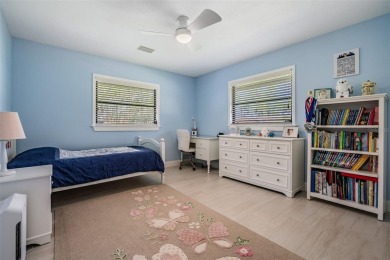 Discover this beautifully updated, move-in-ready pool home on East Lake Woodlands Country Club in Florida - for sale on GolfHomes.com, golf home, golf lot