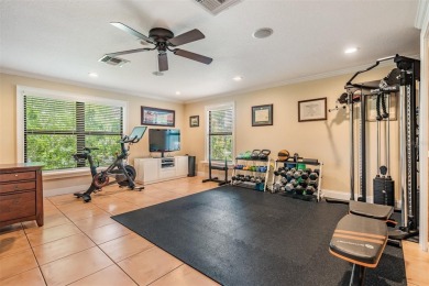 Discover this beautifully updated, move-in-ready pool home on East Lake Woodlands Country Club in Florida - for sale on GolfHomes.com, golf home, golf lot
