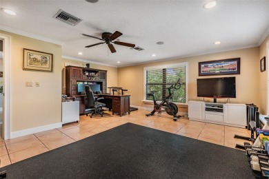 Discover this beautifully updated, move-in-ready pool home on East Lake Woodlands Country Club in Florida - for sale on GolfHomes.com, golf home, golf lot