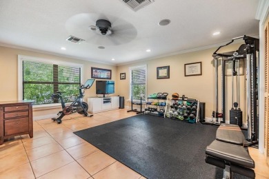 Discover this beautifully updated, move-in-ready pool home on East Lake Woodlands Country Club in Florida - for sale on GolfHomes.com, golf home, golf lot