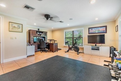 Discover this beautifully updated, move-in-ready pool home on East Lake Woodlands Country Club in Florida - for sale on GolfHomes.com, golf home, golf lot