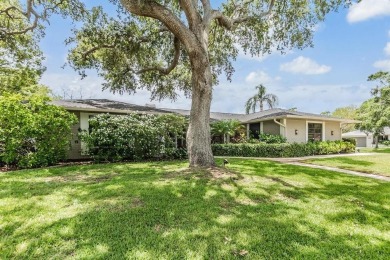 Discover this beautifully updated, move-in-ready pool home on East Lake Woodlands Country Club in Florida - for sale on GolfHomes.com, golf home, golf lot