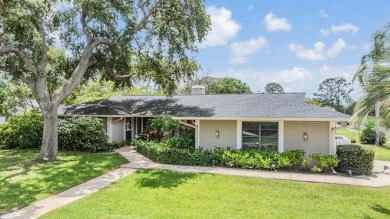Discover this beautifully updated, move-in-ready pool home on East Lake Woodlands Country Club in Florida - for sale on GolfHomes.com, golf home, golf lot