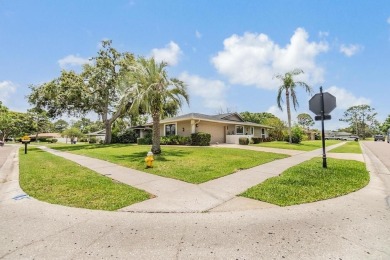 Discover this beautifully updated, move-in-ready pool home on East Lake Woodlands Country Club in Florida - for sale on GolfHomes.com, golf home, golf lot